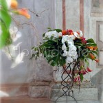 Addobbo arancio per cerimonia rustic chic con rose e orchidee