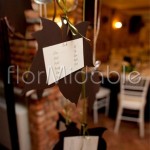 Dettaglio tableau mariage matrimonio autunnale con rami nocciolo