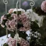 Romantiche alzate portafiori per addobbo buffet