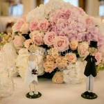 Centrotavola con rose e ortensie nei toni pastello e cipria